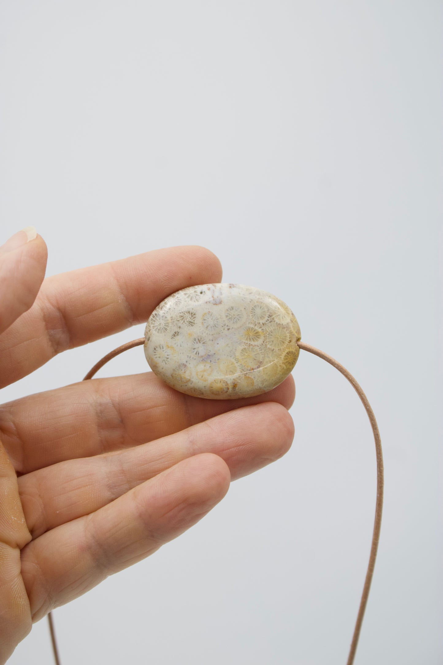 Versteinerte Koralle Amulett IV
