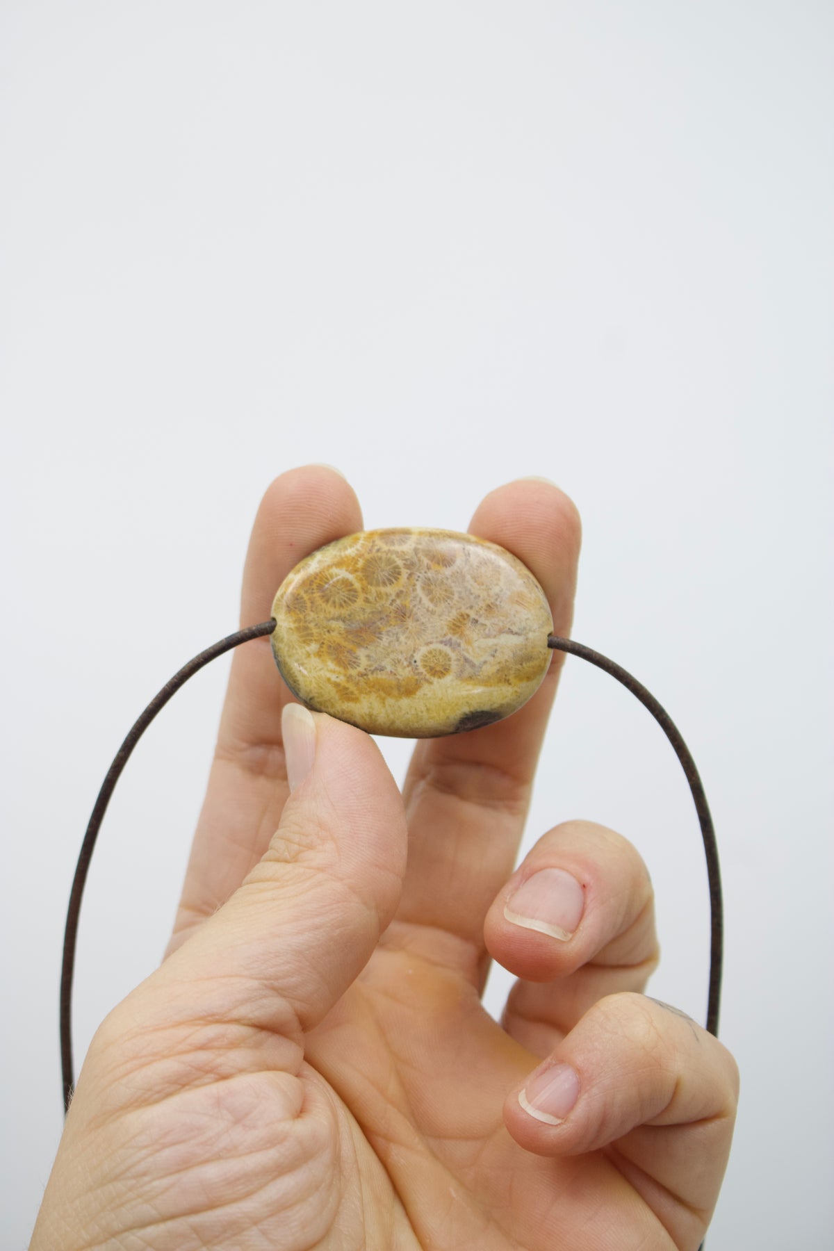 Versteinerte Koralle Amulett I