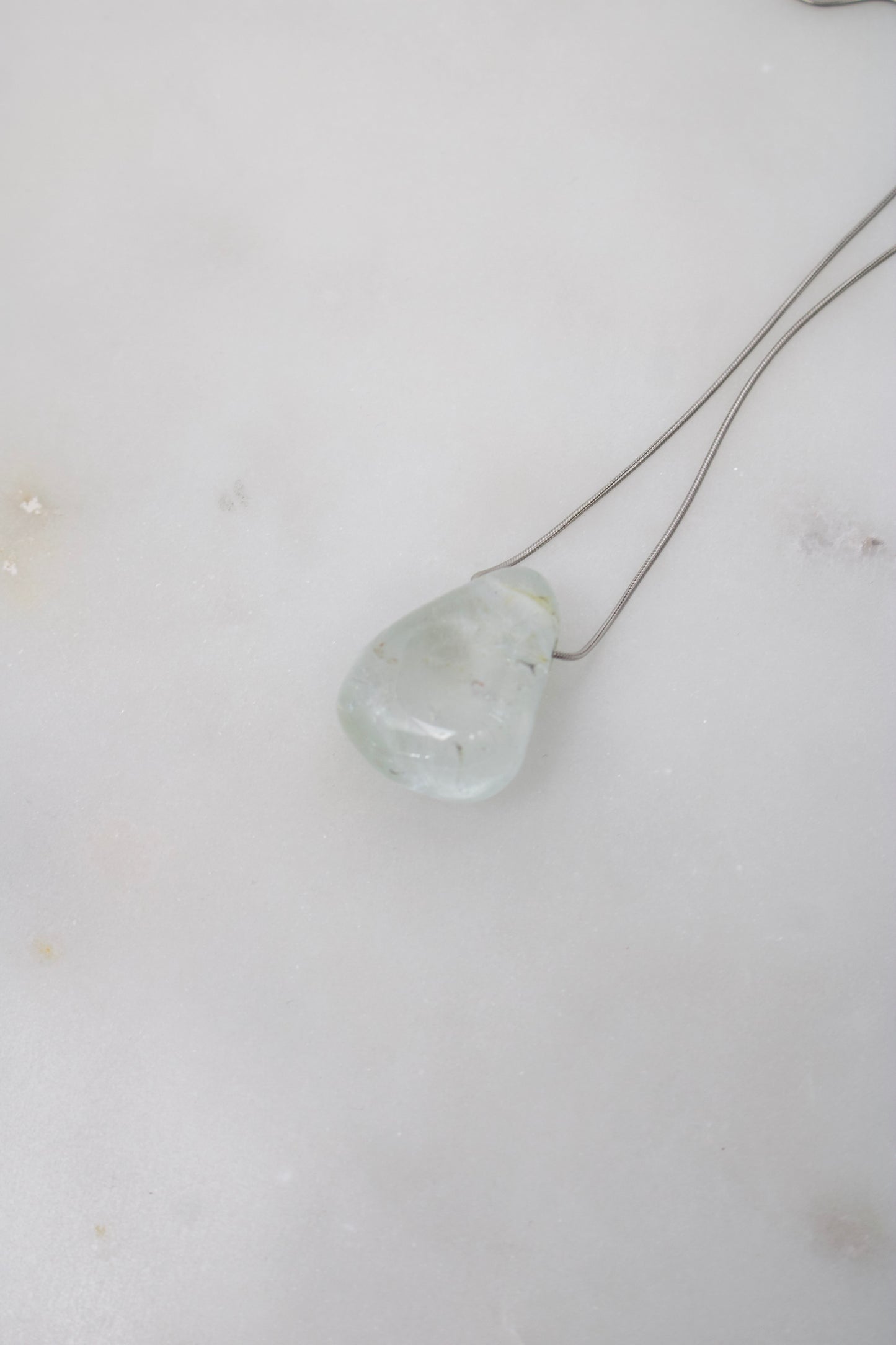 Topas mit Schlangenkette